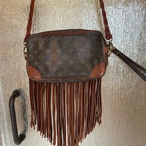 Vintage Louis Vuitton monogram crossbody with leather fringe